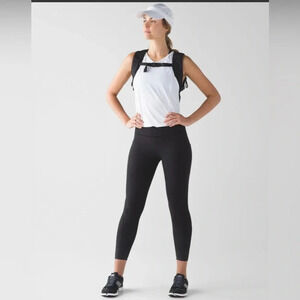 Lululemon Tight Stuff Reflective Capri Leggings sz 4